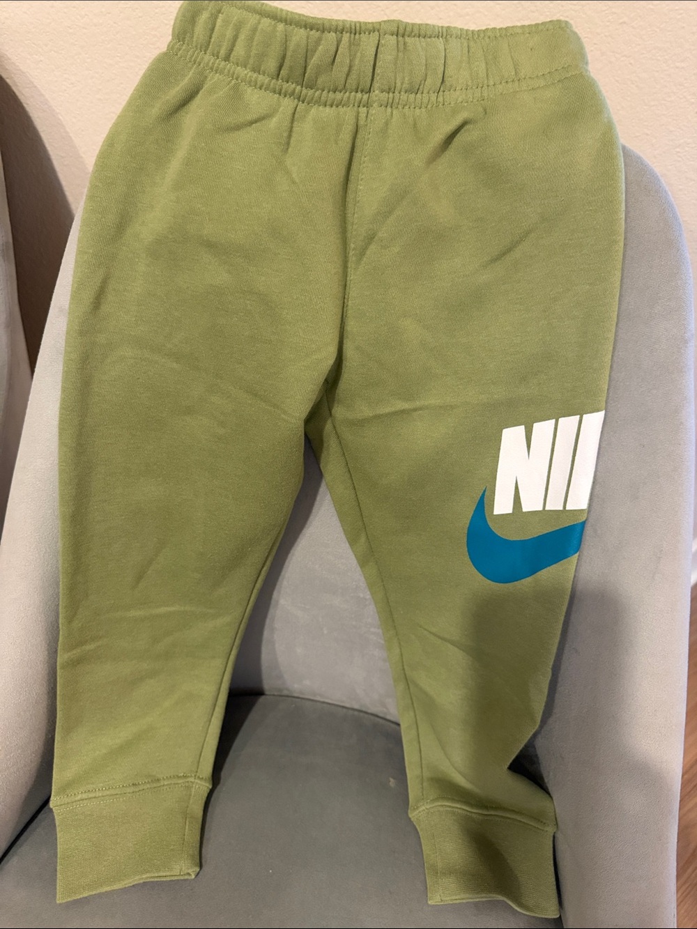 Nike Kids Olive Green Sweatpants with Blue Swoosh